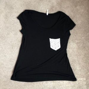 black t shirt with white detailed pocket